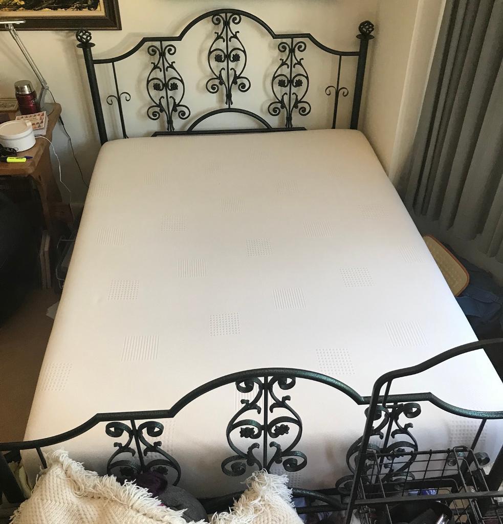 Cast iron double bed with memory foam mattess in Christchurch, Dorset
