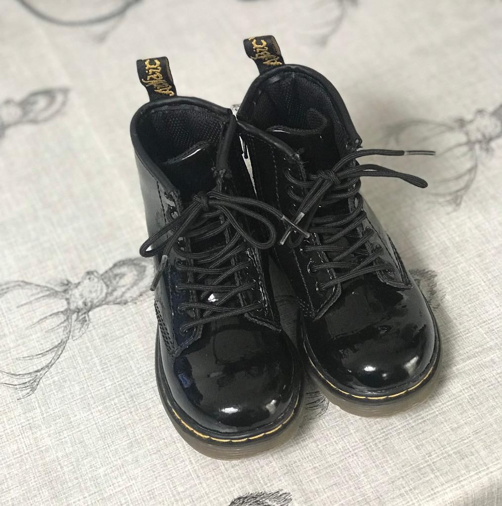 Kids Dr. Martens black patent boots in Parkhead