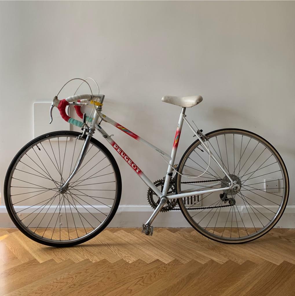 Classic vintage ladies Peugeot bicycle in Islington