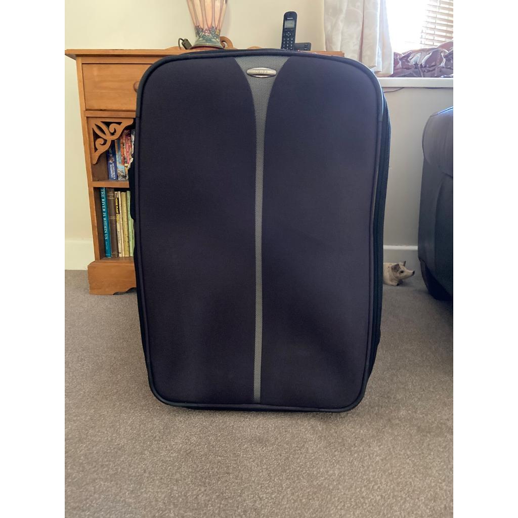 Medium Size Navy Tripp Suitcase In Good 