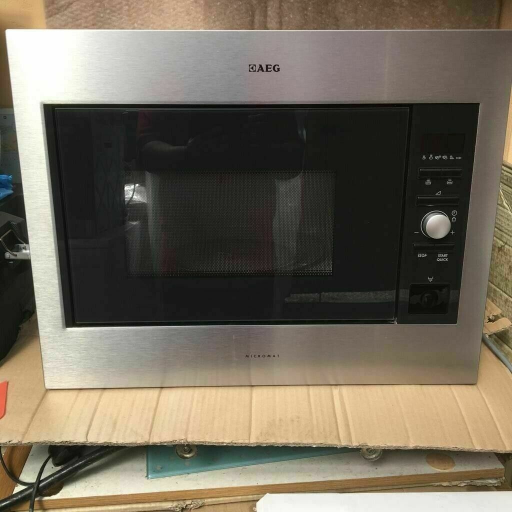 **AEG INTEGRATED MICROWAVE OVEN**FULLY WORKING**ONLY 1 YEAR OLD