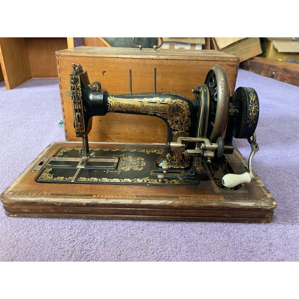 Early 1900 Frister and Rossman hand crank sewing machine and case in