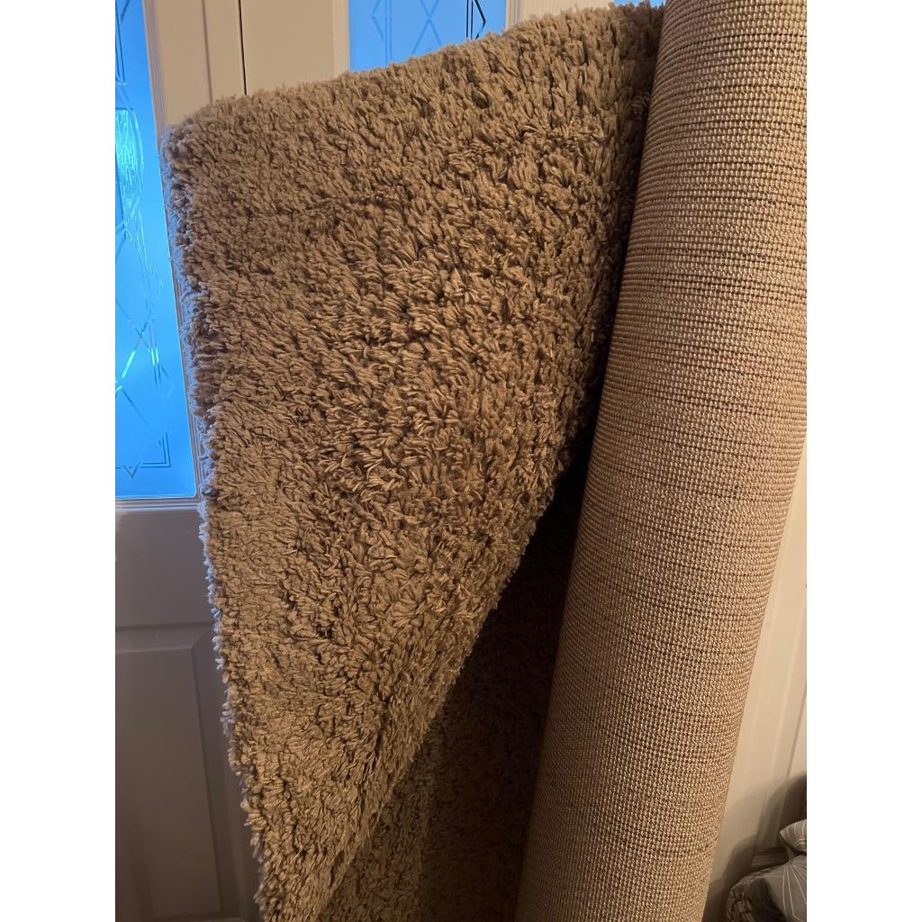 Large 5 x 7ft Dunelm cream/beige rug in Newthorpe, Nottinghamshire