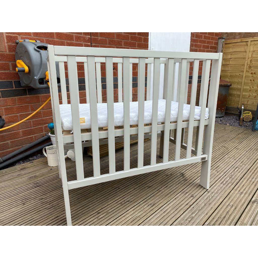 Mamas and Papas Petite Cot and Mattress is Pebble grey in