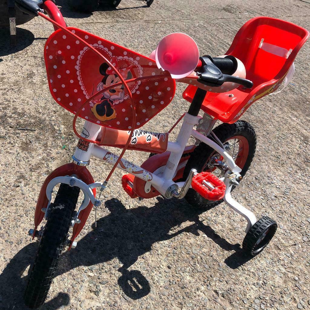 minnie mouse bike with doll carrier