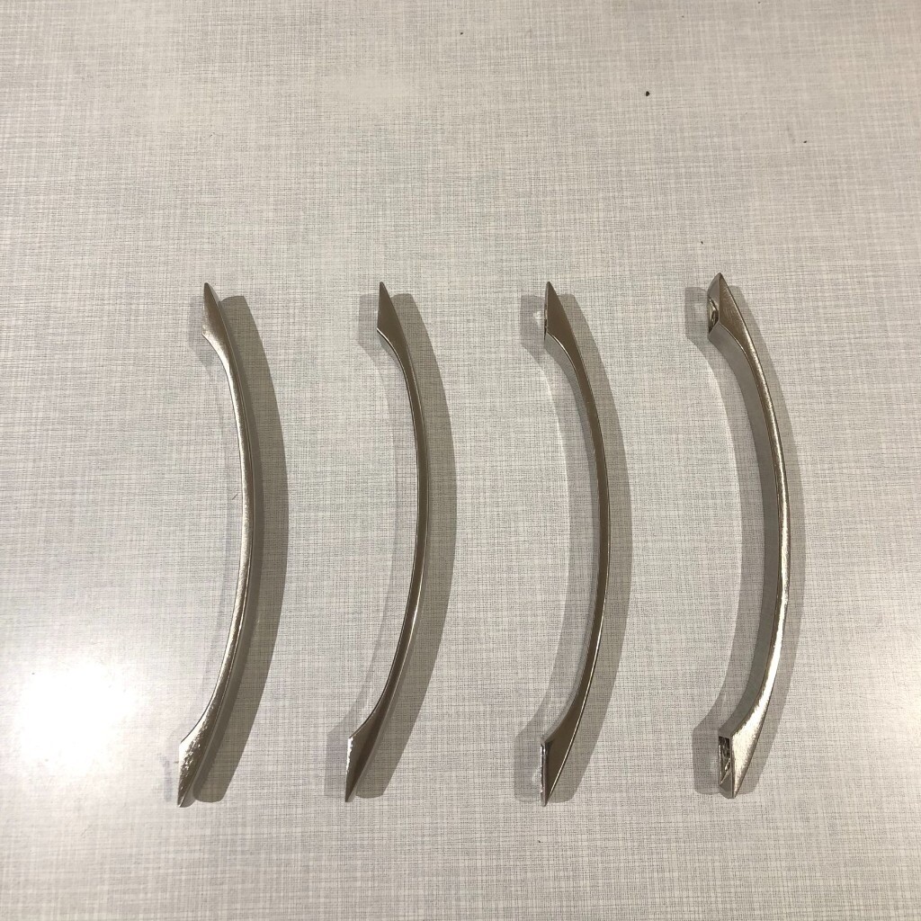 Brushed steel kitchen handles x 20 nearly new in Clapham