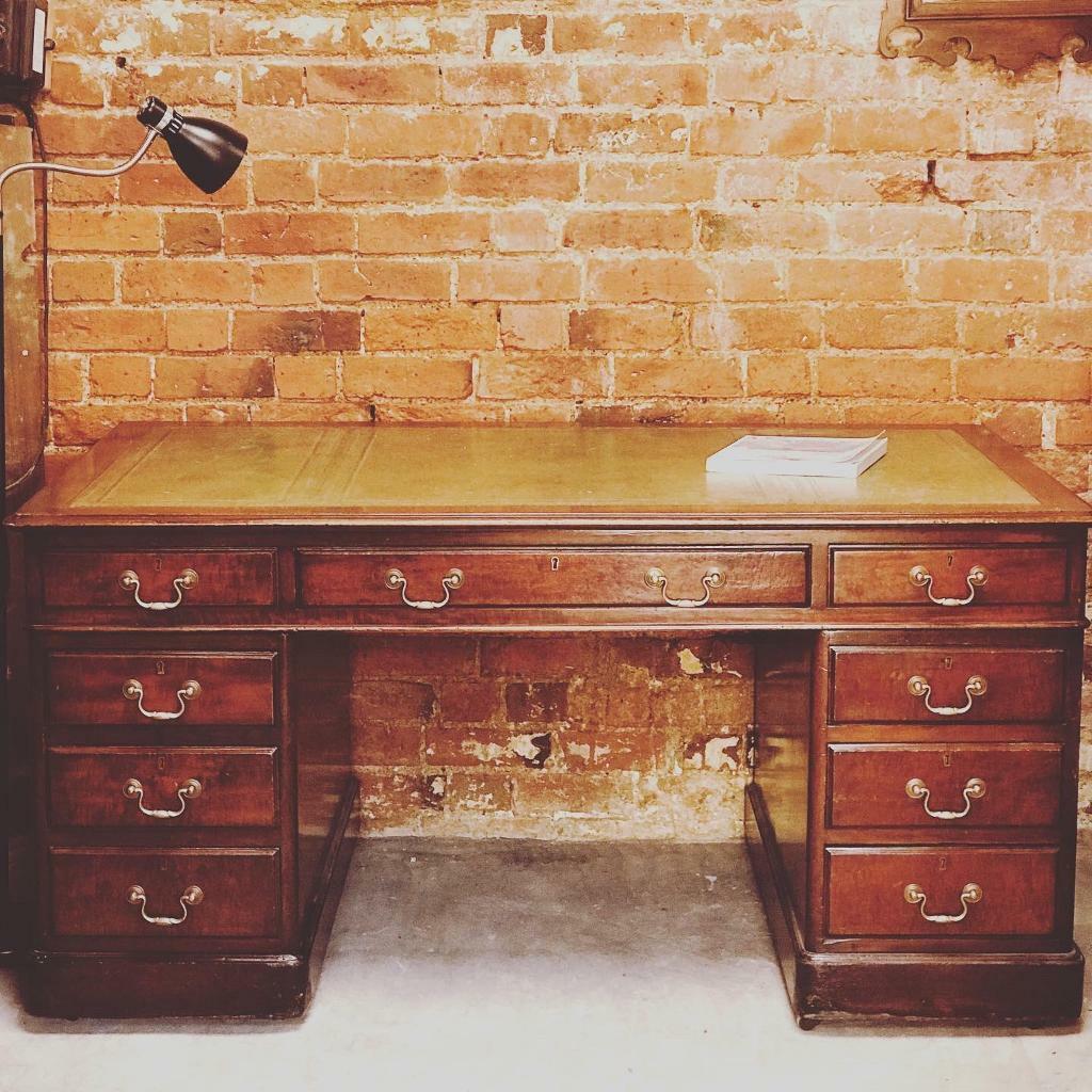 Very large antique leather captains partners writing desk in