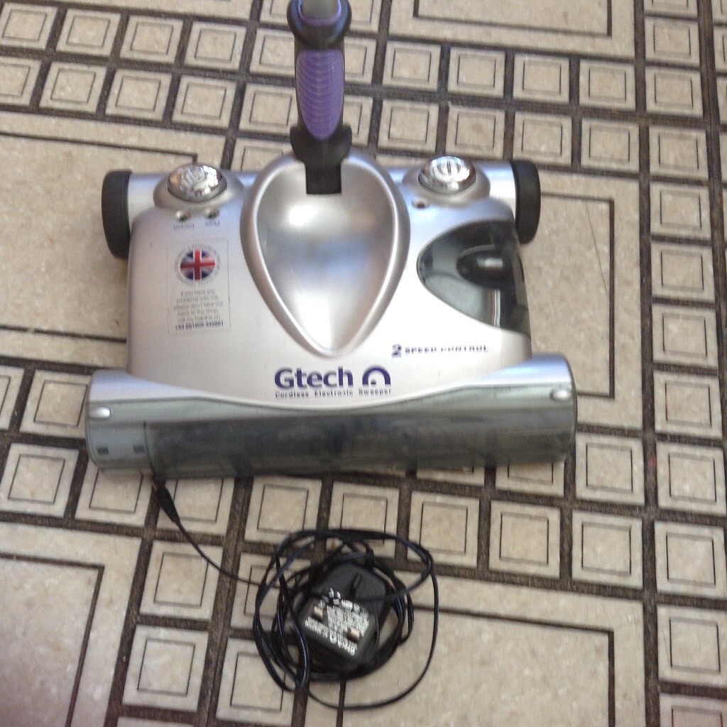 GTECH CORDLESS ELECTRONIC SWEEPER. USED. GOOD CONDITION LIGHT WEIGHT