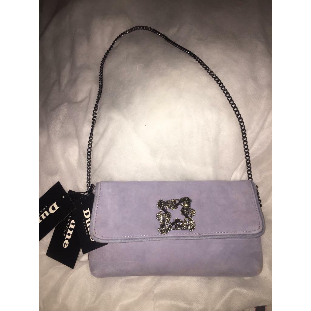 pale blue suede clutch bag