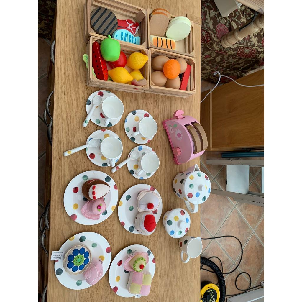 emma playing kitchen set