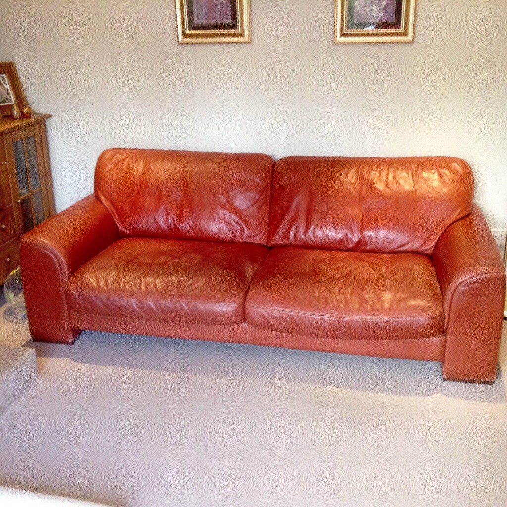 2 terracotta 'full' leather sofas....(can be bought individually) in