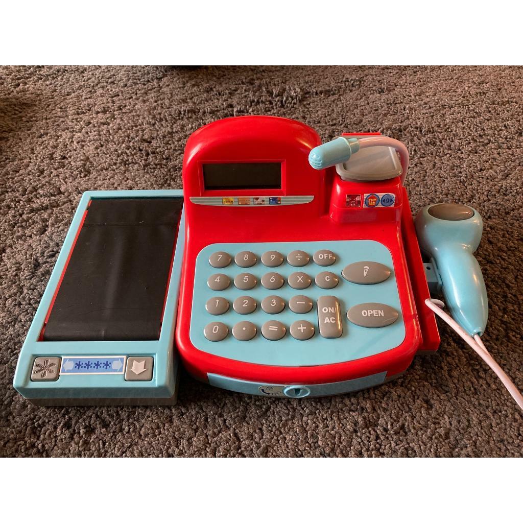 toy till with conveyor belt