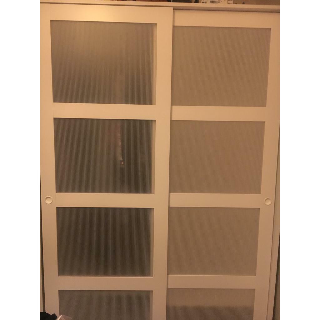 IKEA KVIKNE Wardrobe with 2 sliding doors, white, 120x190 cm in