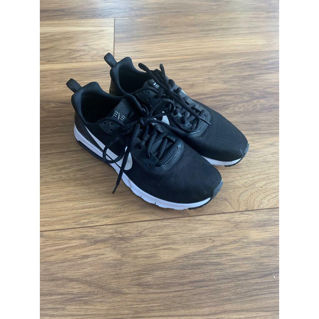 black nike trainers junior