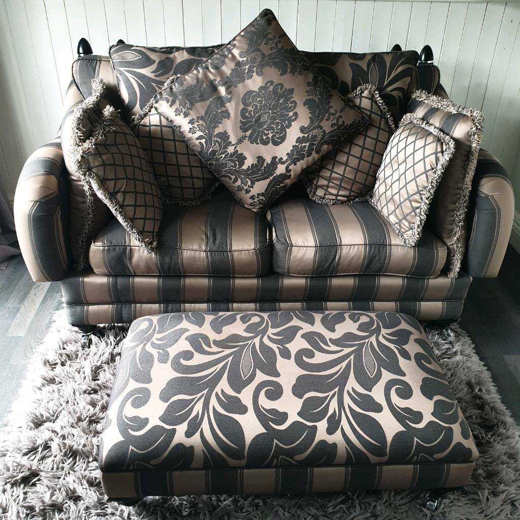 Parker knoll luxury drop arm sofa and footstool. Can deliver in