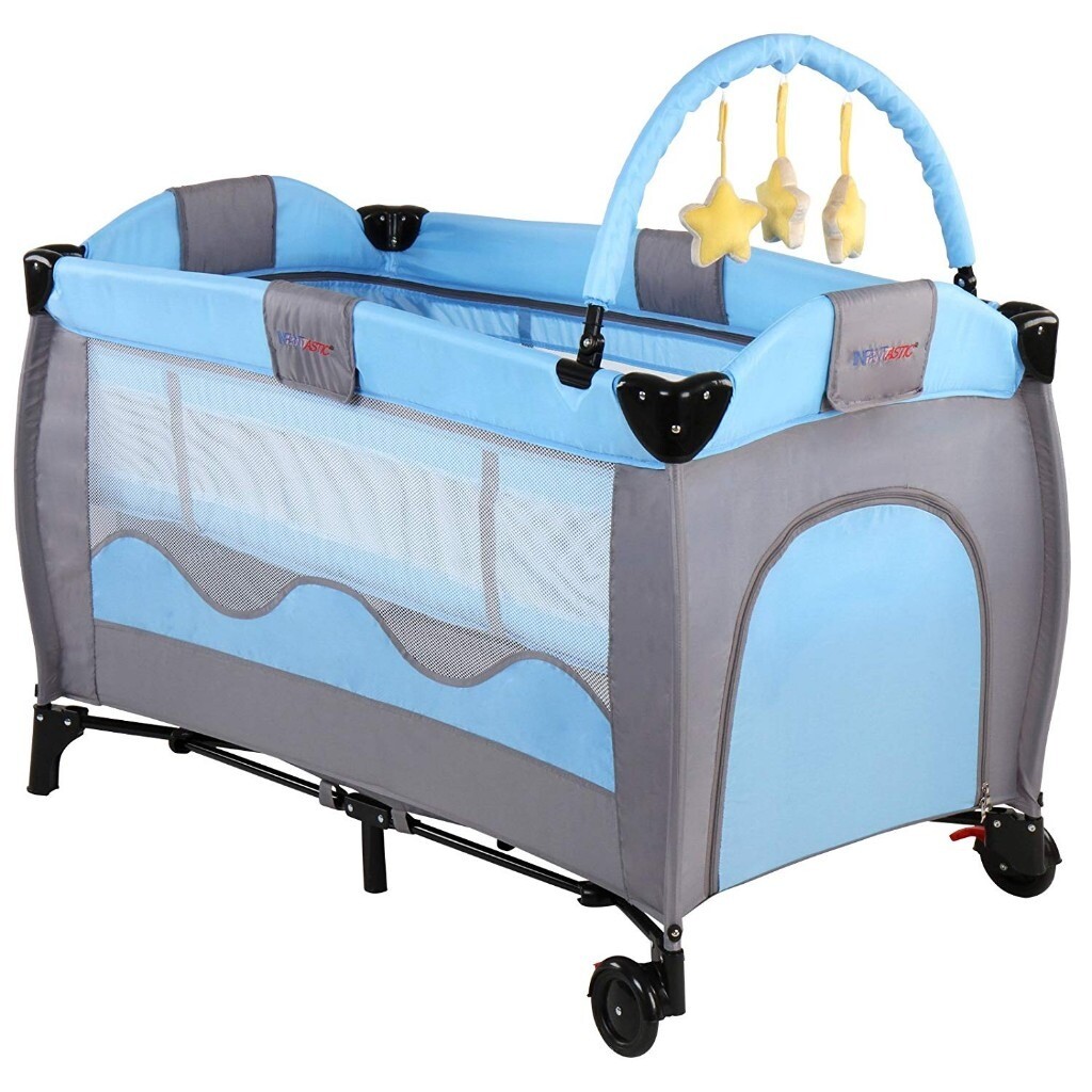 Baby travel cot in blue. Adjustable to two levels in Dagenham, London