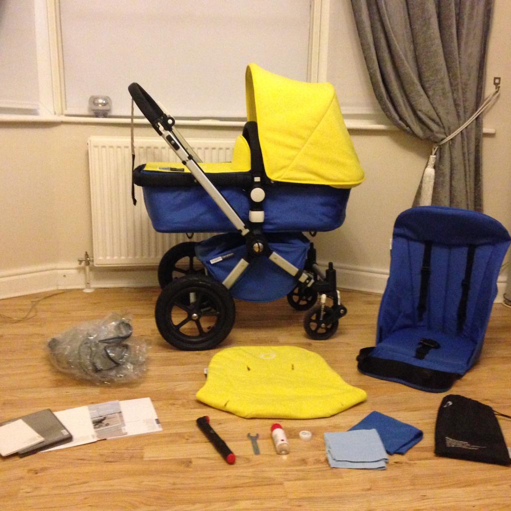 Beautiful Bugaboo Cameleon Pram with carrycot and raincover Blue