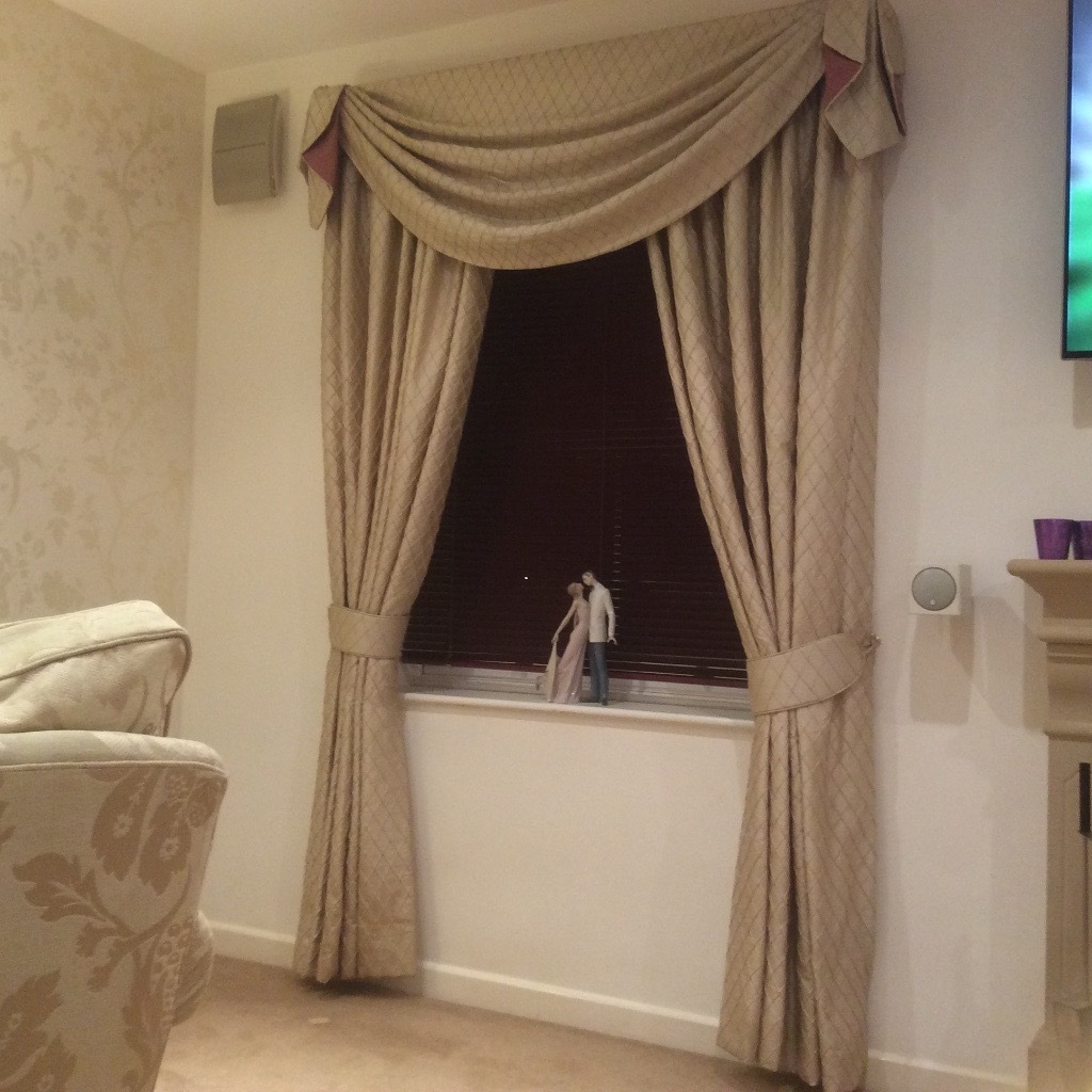 Stunning bespoke cream interlined real silk curtains with swags in