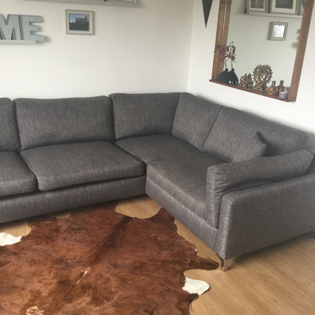 Corner Sofa bought 12 months ago from Sofa Works. Dark grey fabric with
