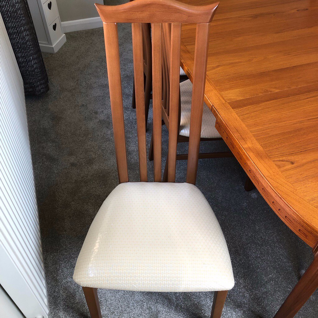 Dining chairs x 6, like new. Chairs still with plastic covering. in