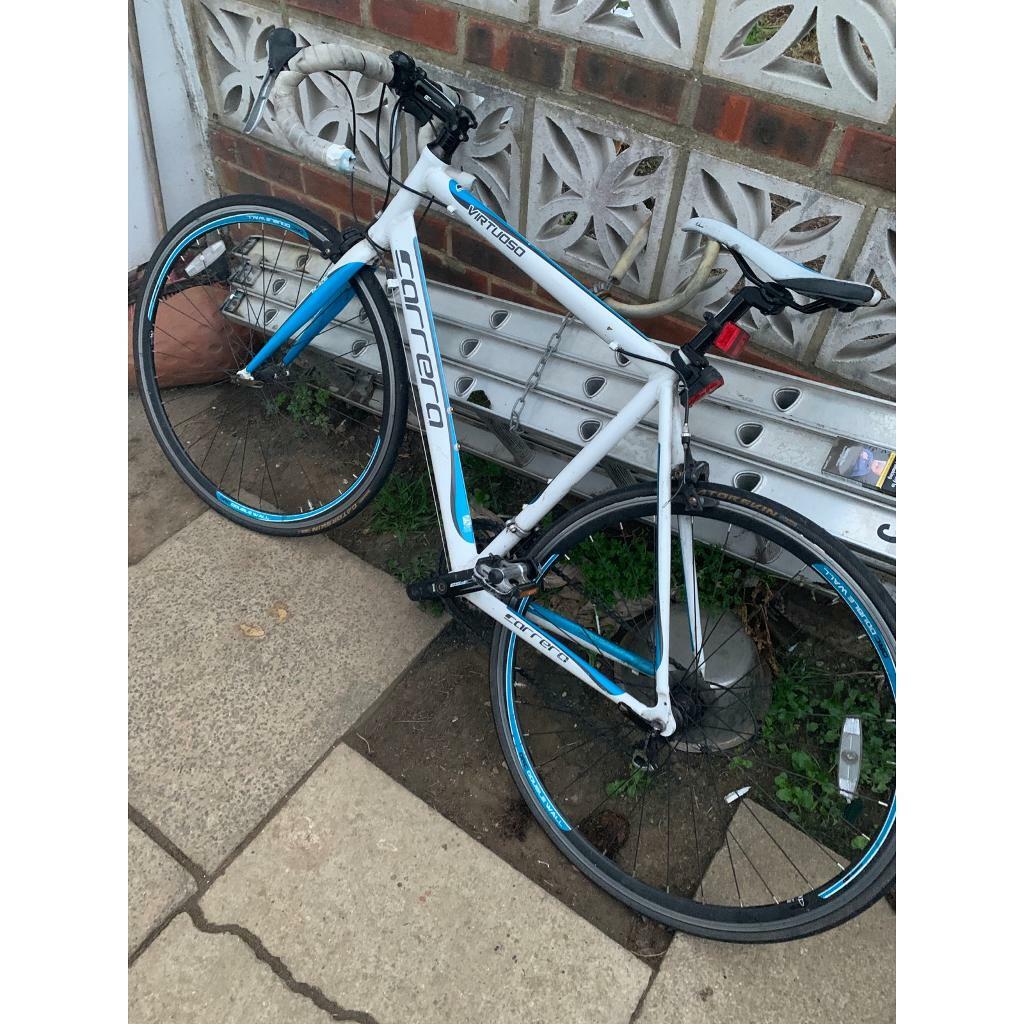 Carrera virtuoso men road bike for sale not specialized cube mountain