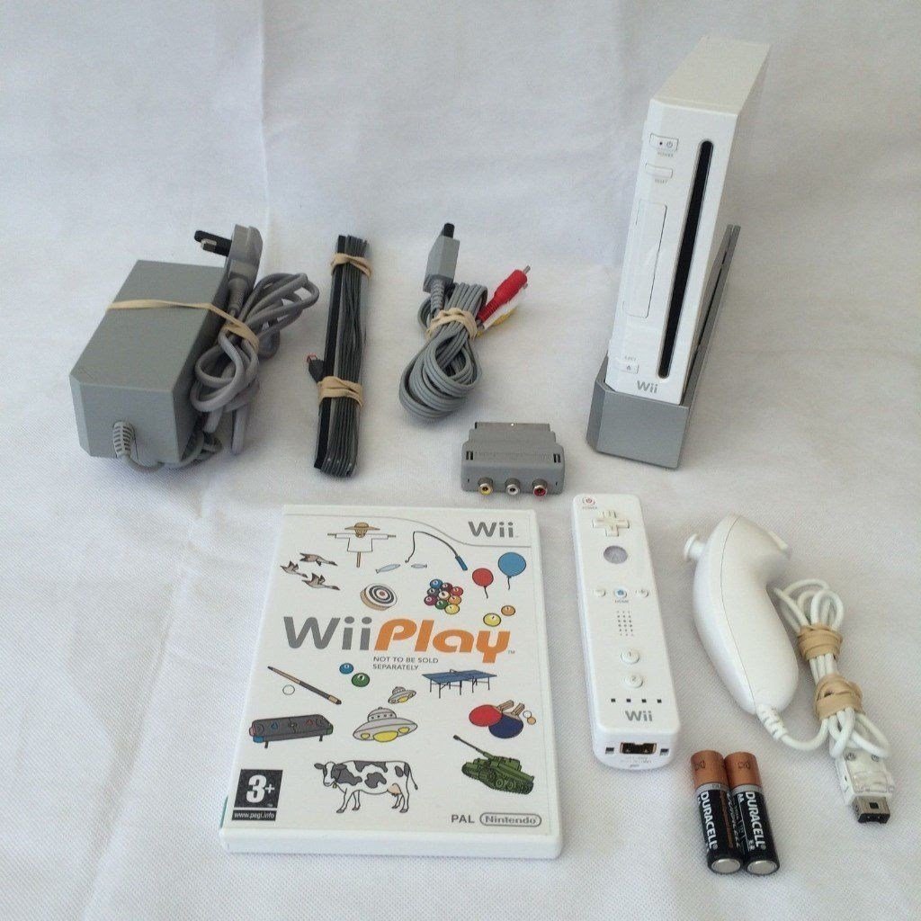 Nintendo wii complete with remote control and all accessories plus game