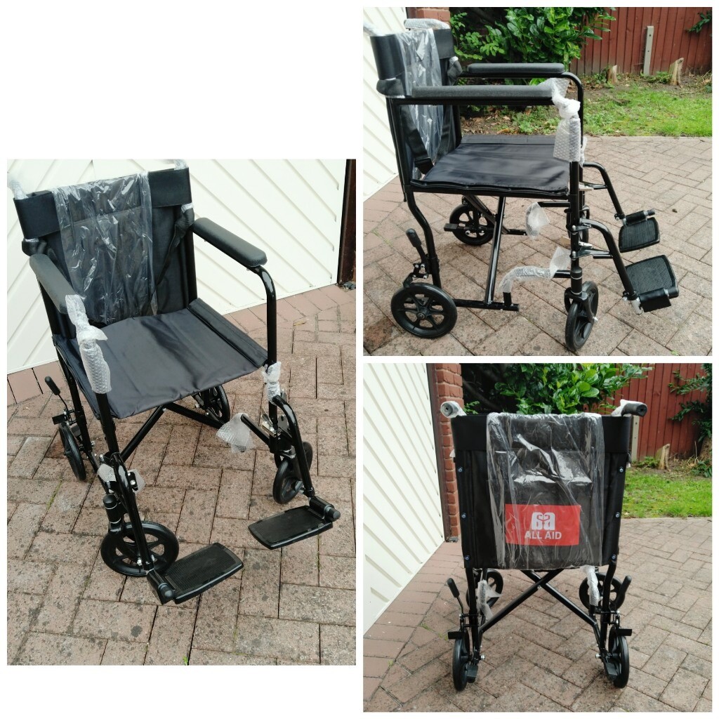 BRAND NEW Lightweight Folding Wheelchair with Footrest for sale in