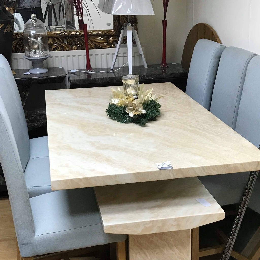 Beautiful Crema engineered marble Dining table plus 6 chairs in