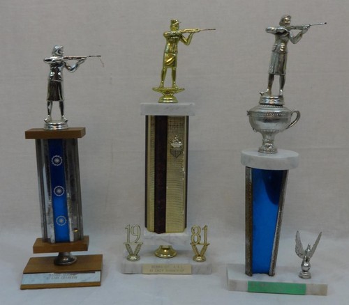 Beautiful group of vintage women's shooting trap skeet target figural trophies