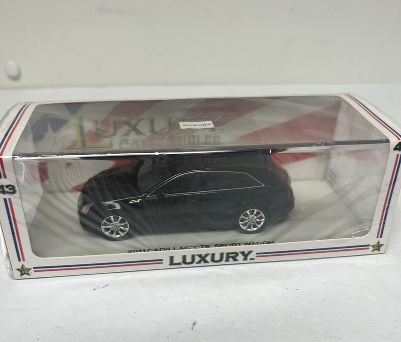 LUXURY COLLECTIBLES 1/43 BLACK CADILLAC 2011 CTS SPORT WAGON NEW