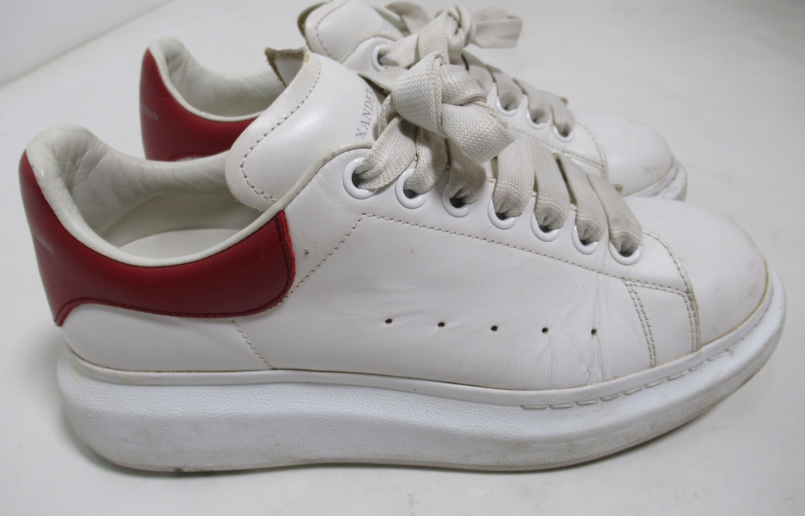 Alexander McQueen Women's Oversized Sneaker In White/ Lust Alexander McQueen Women's Oversized Sneaker In White/ Lust