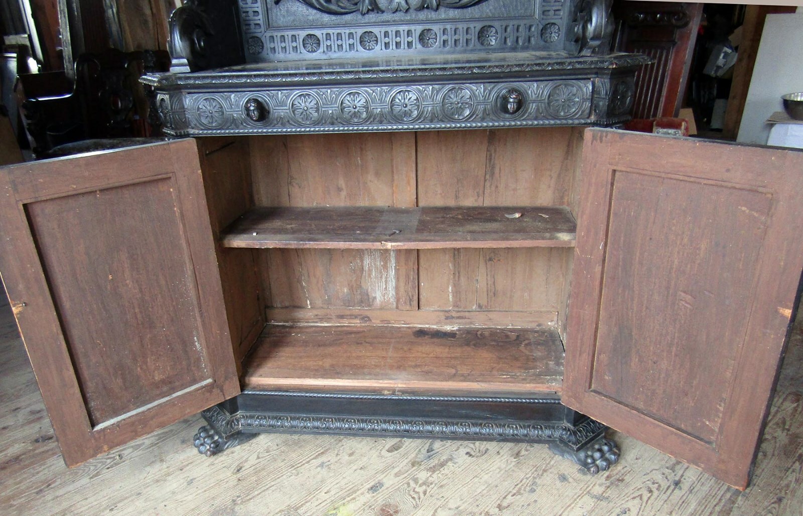 VICTORIAN EBONIZED FIGURAL HEAVILY CARVED CABINET HORNER