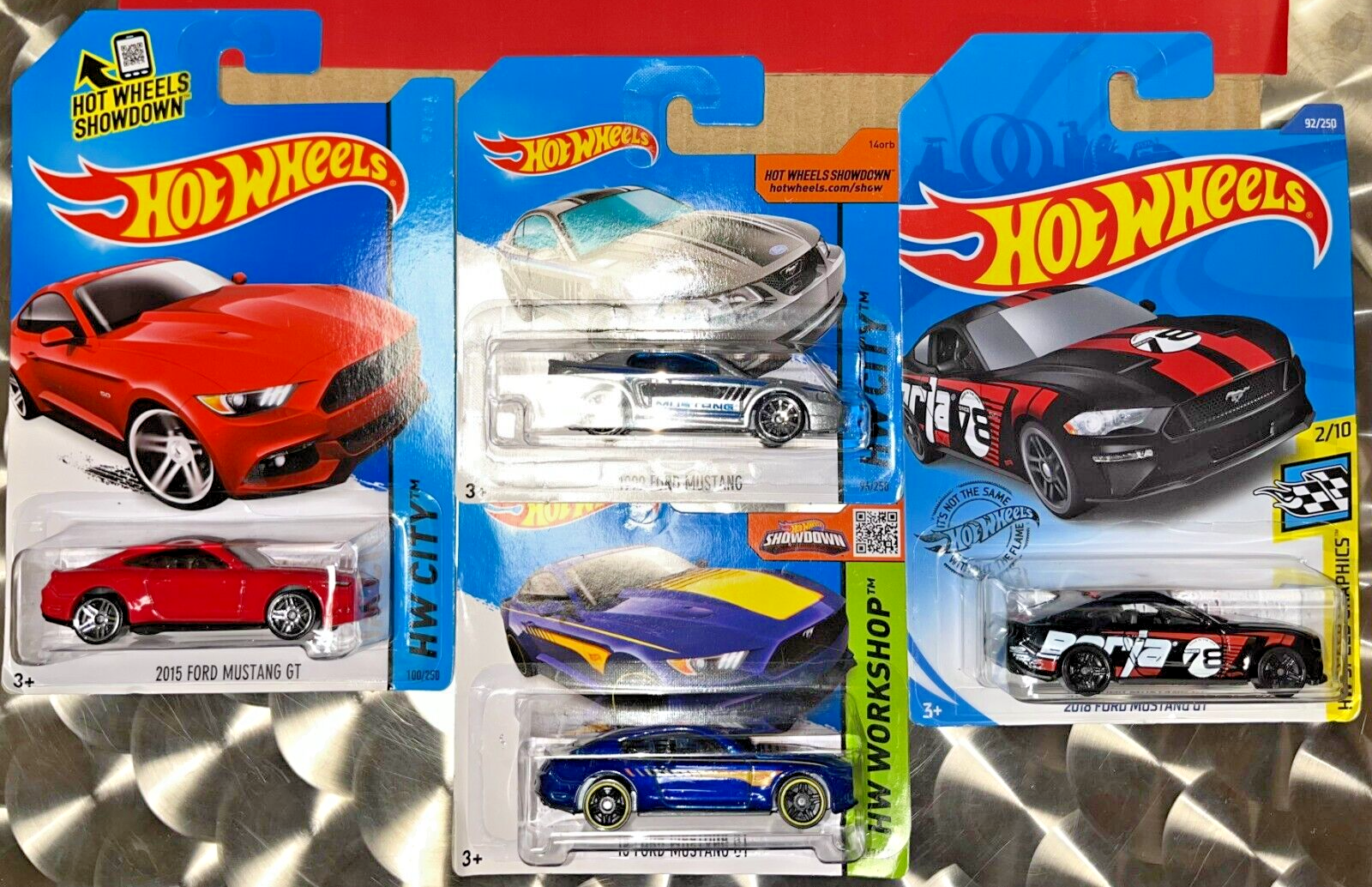 HOT WHEELS 1:64 SET OF 4 FORD MUSTANGS. 1 RED & 1 BLUE 2015
