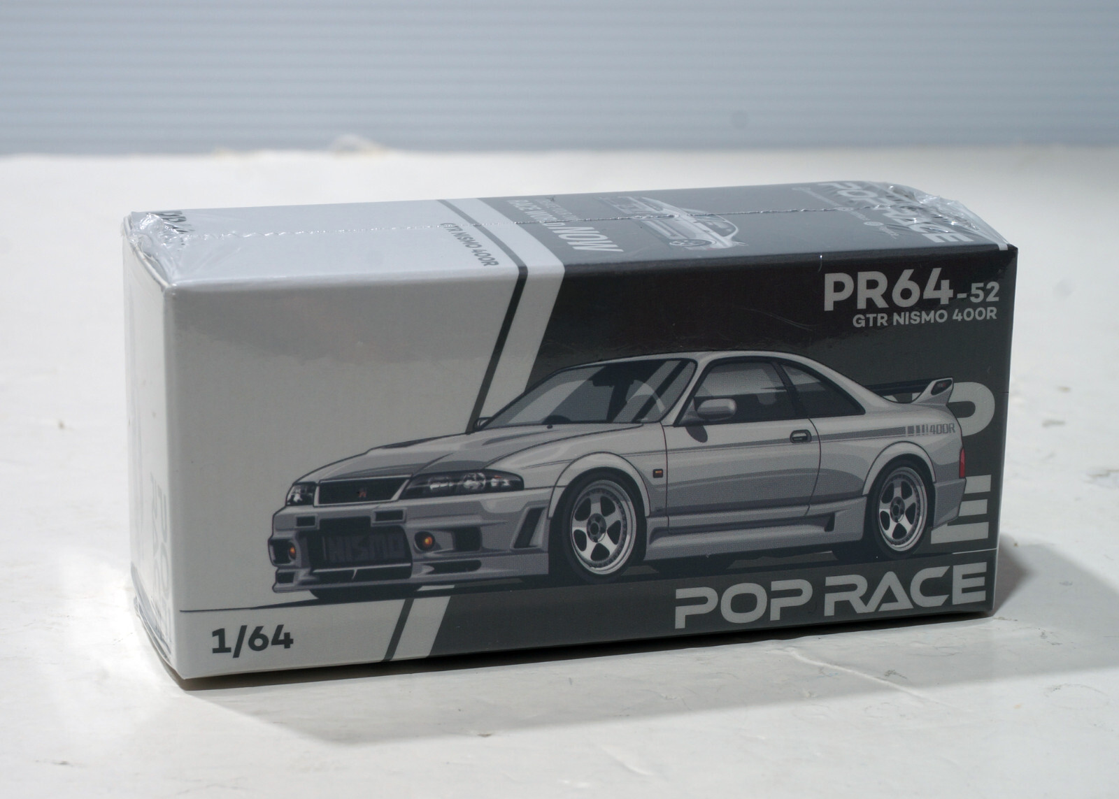 PopRace 1/64 Nissan Skyline GT-R R33 Nismo 400R White Pop