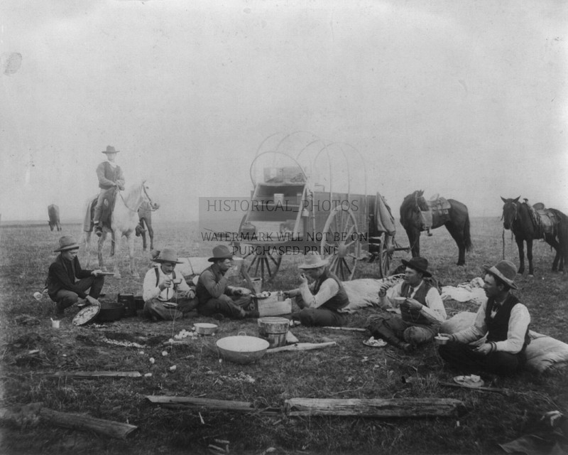 COWBOYS EATING OUT OF CHUCKWAGON OUT ON THE RANGE 1880