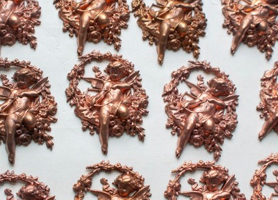 RAW BRASS STAMPINGS CUPID!  2''H X 1 3/4'' W  12 PCS.