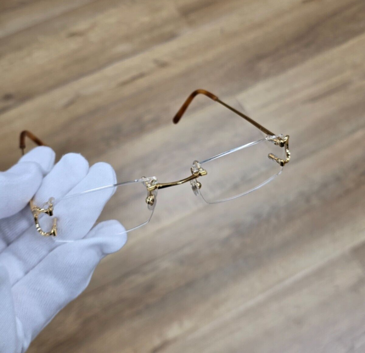 CARTIER CARTIER RECTANGULAR RIMLESS 53MM GOLD UNISEX EYEGLASSES CT0092O 001