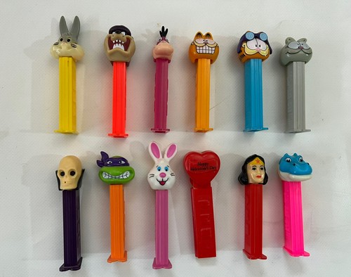 Lot of 12 Vintage Pez Dispensers Bugs Bunny Dr Skull TMNT