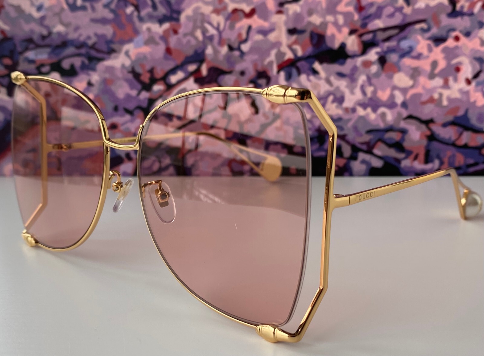Gucci GG0252S Women's Pink Lens Gold Frame Butterfly