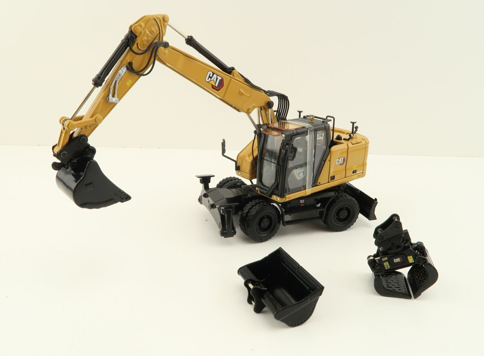 Diecast Masters 85956 Caterpillar CAT M318 Wheeled Excavator Diecast Masters 85956 Caterpillar CAT M318 Wheeled Excavator