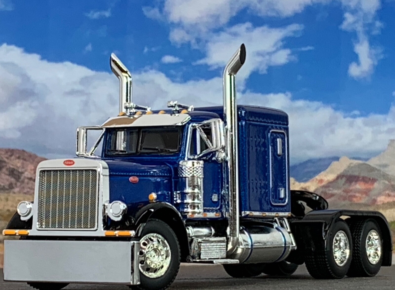 1/64 DCP BLUE/BLACK PETERBILT 379 W/ 63