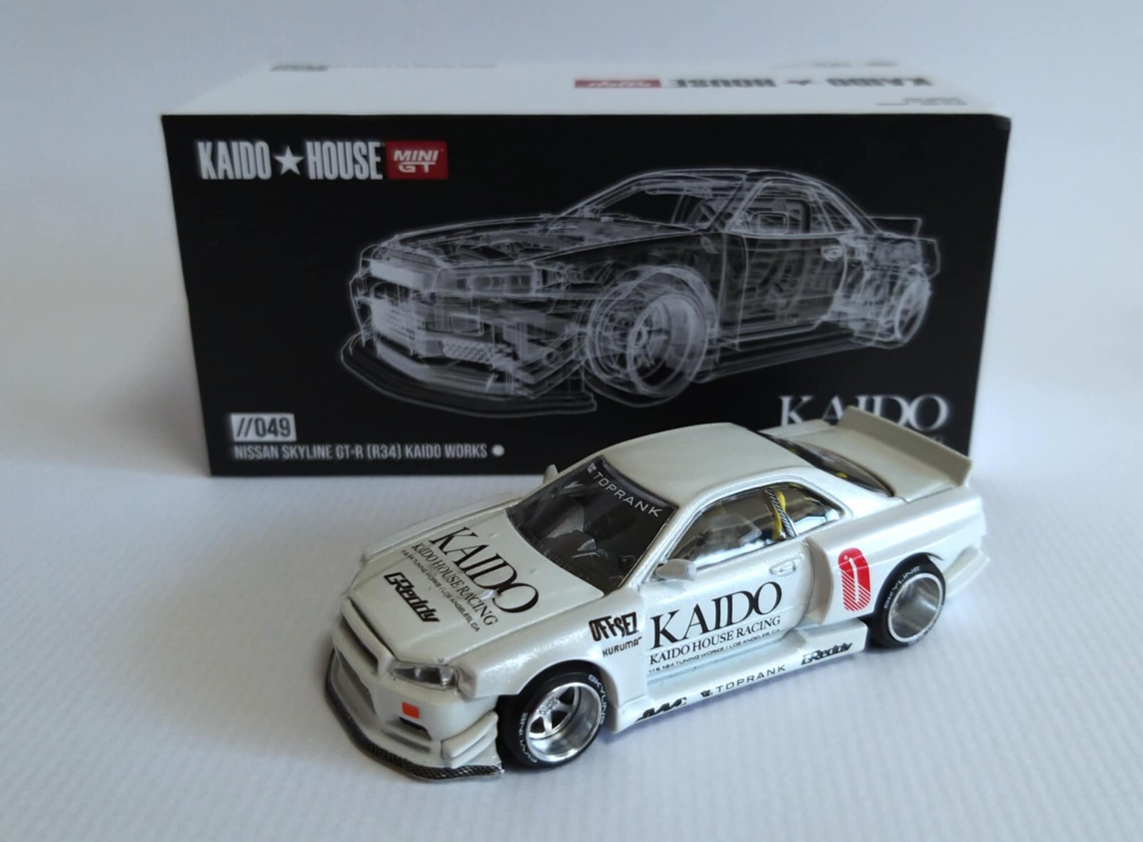 MINIGT 街道ハウス GT-R (R34) Brazil Kaido House x Mini GT Nissan GT-R R34 Kaido Racing Factory
