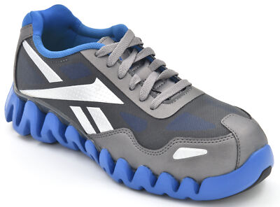 靴 rfk_b.iq REEBOK Sz.6 1/2, ZIGTECH SCHOOL SHOE BLACKTOP/ORANGE OUTSOLE