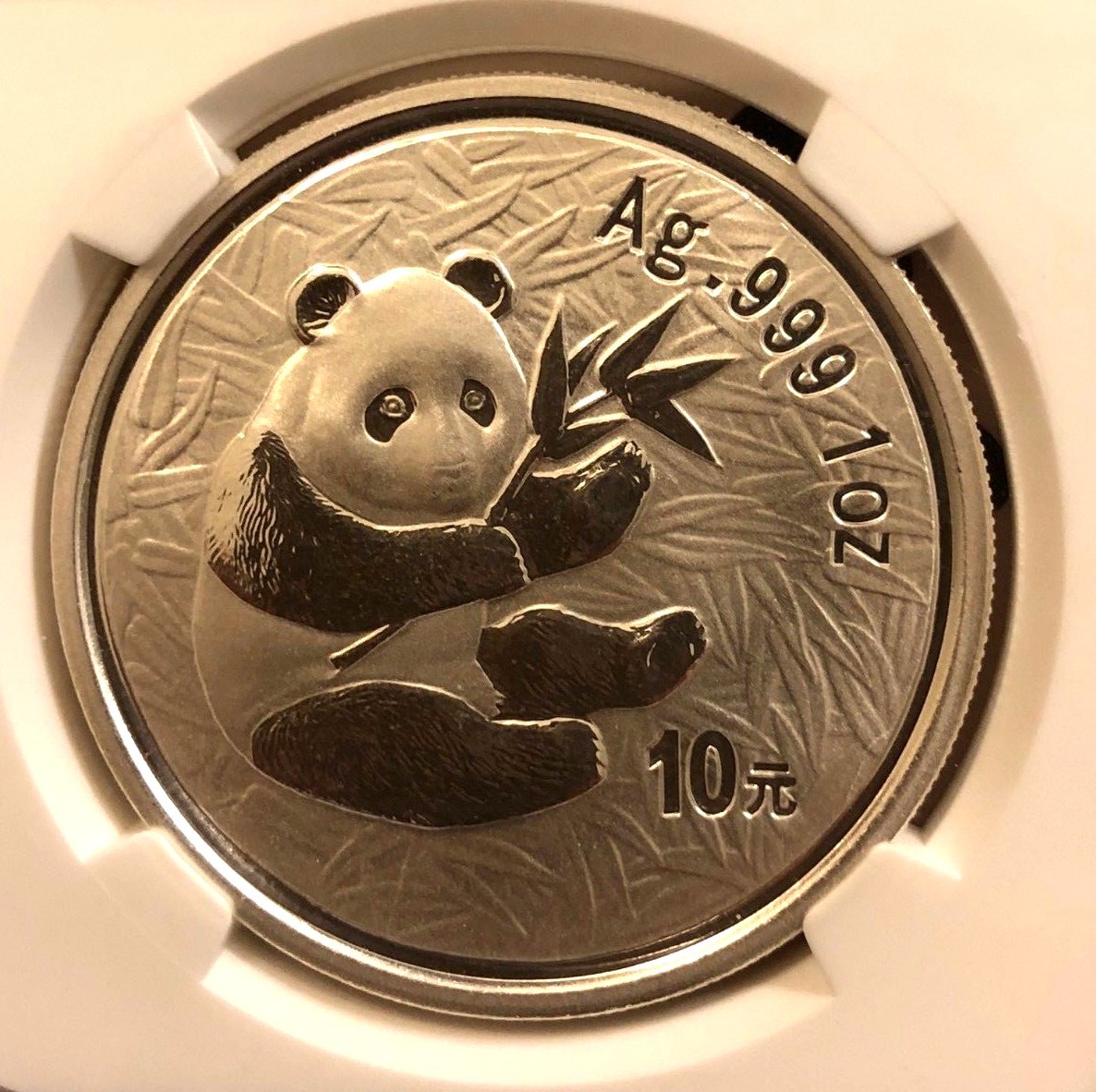China 2000 1 oz 10 Yuan 'MIRRORED' Silver Panda NGC MS69 SN:4564977-004