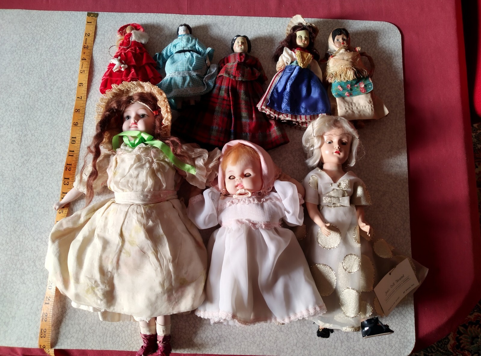Job lot of 8 interesting vintage & antique dolls collected and stood on