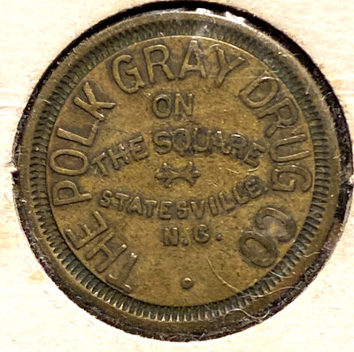 #A9445,Statesville NC The Polk on the Square Gray Drug Store 24mm 5c Cigar Token