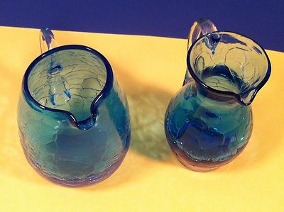 Pair of Small Blue Crackle Glass Pitchers