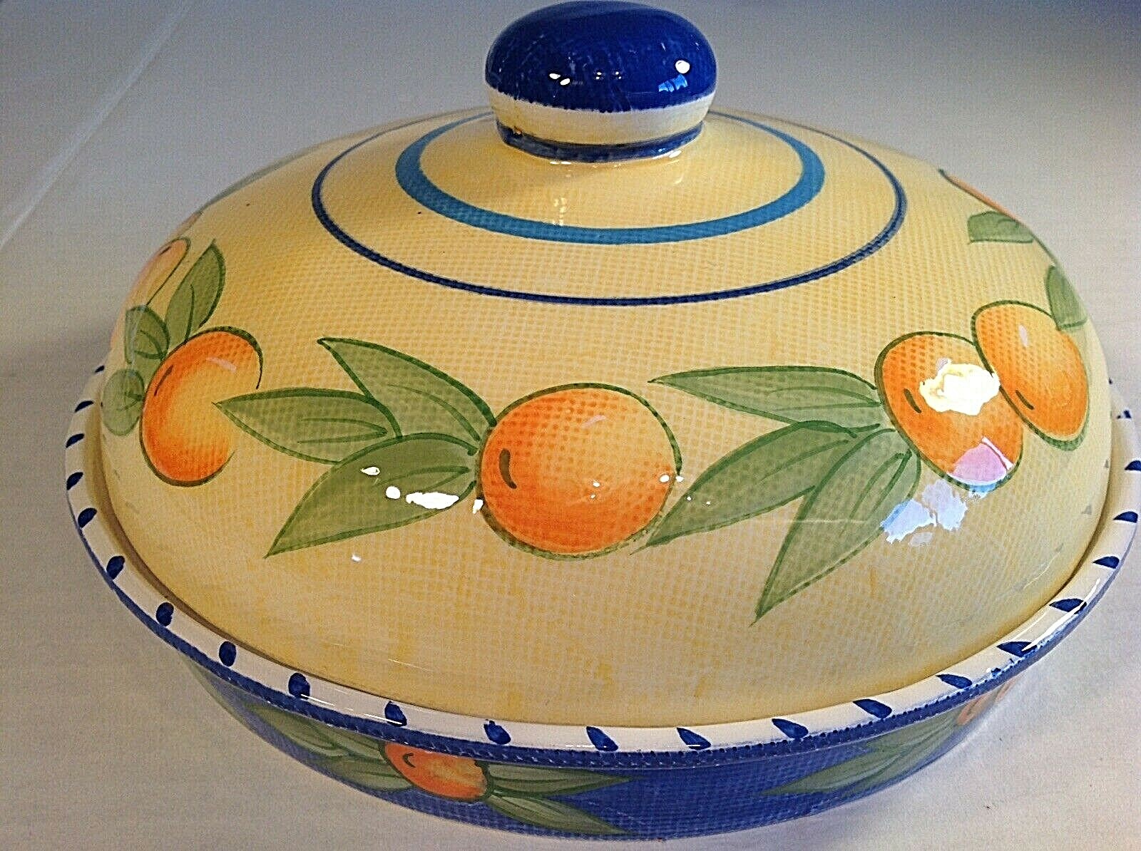 Boston Warehouse Trading Corp. Garlic Baker  4 X 7.5 Inches. Oranges