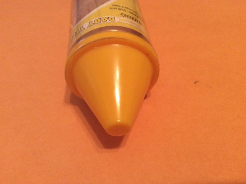 1998 Goldberger Crayon Baby Yellow Doll in a tube crayon #40370