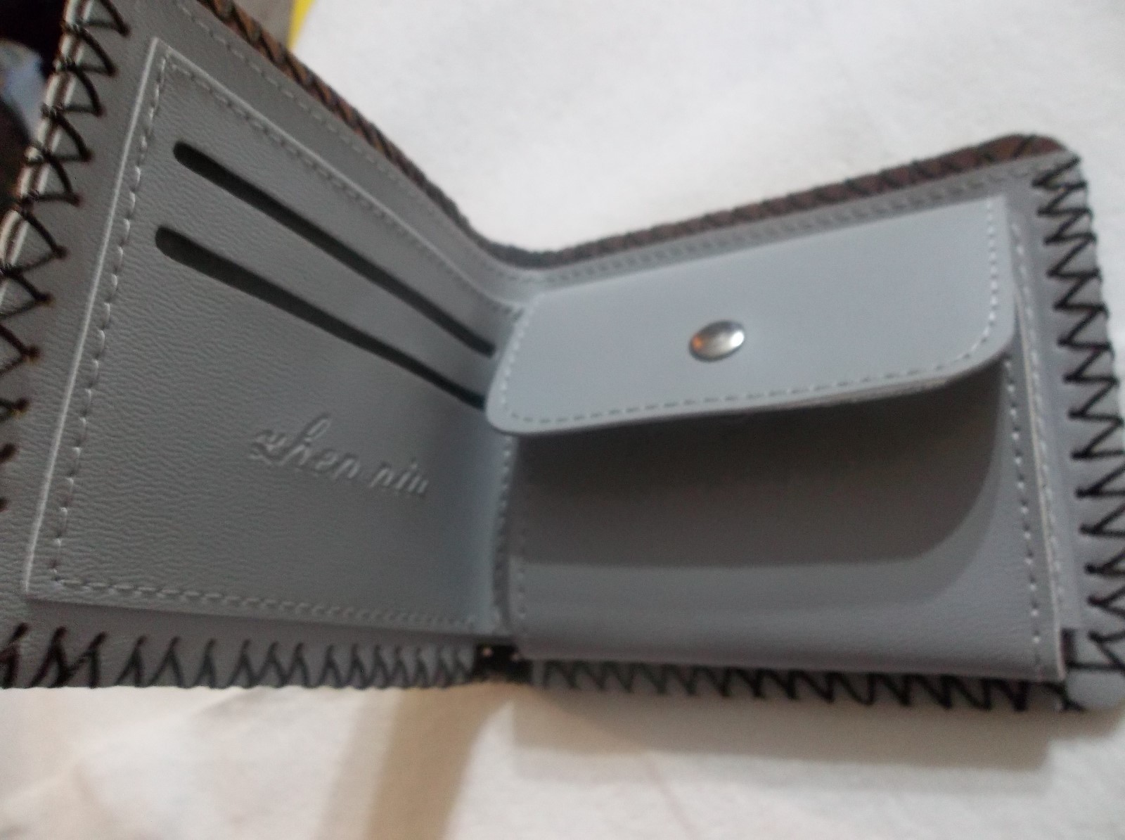 2-WALLETS WITH $100 PICTURED ON THEM.NEW WITH EXTRA SPACES-LEATHER. FREE EYRING